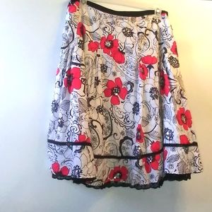 Limited too- 100% cotton skirt with red flowers and black and white patterns